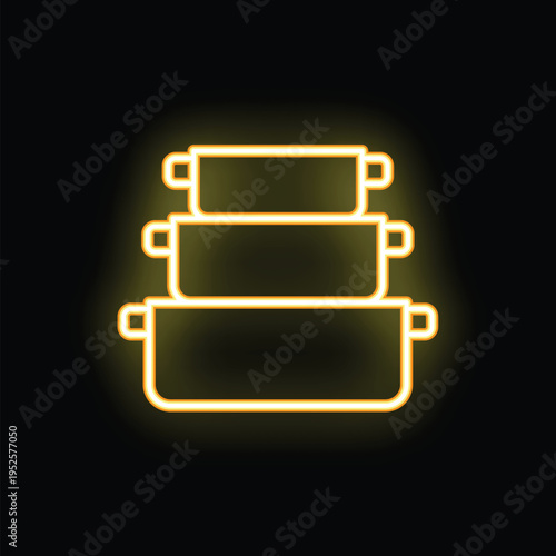 Stack of three saucepans with handles glowing yellow, concept for kitchenware and cooking