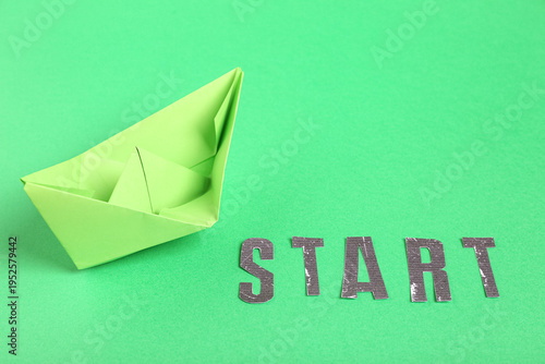 Origami boat with word STAR...
