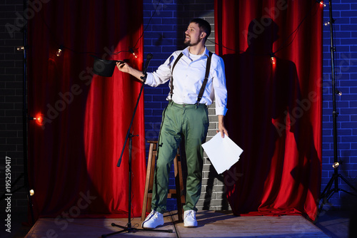 Male actor with film script...