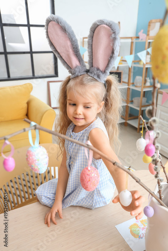 Cute little girl in bunny e...
