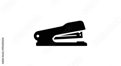 Black office stapler on white background.