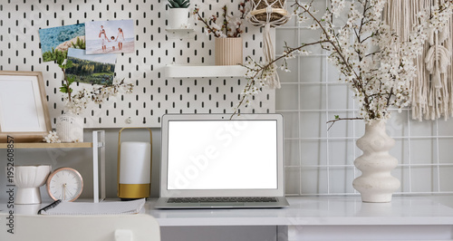 Workplace with blank laptop...