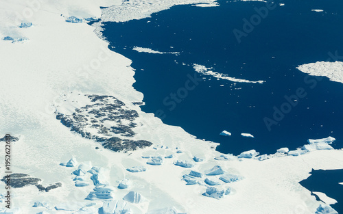 Aerial view of icy coastline of Antarctica.