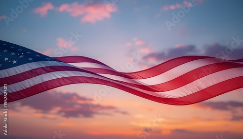 A waving American flag against a serene sunset sky with vibrant clouds