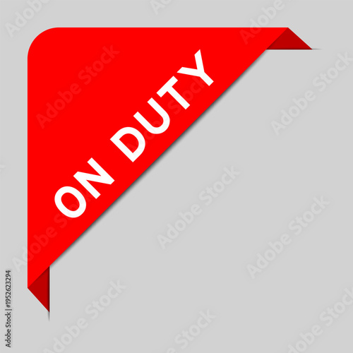 Red color of corner label banner with word on duty on gray background
