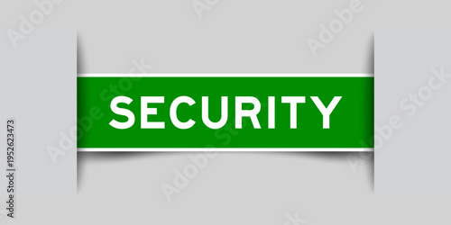 Green color square shape sticker label with word security inserted in gray background