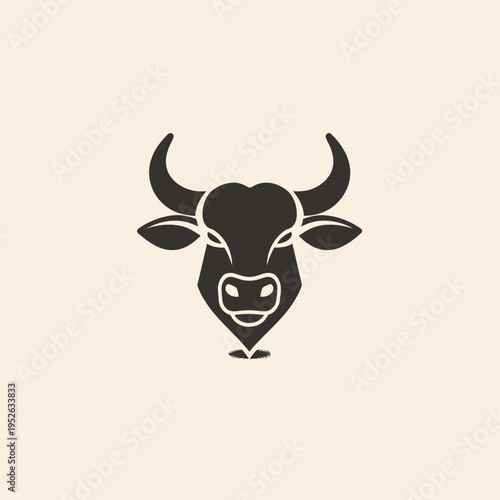 Minimalist geometric bull head icon. Strong dark ox silhouette with horns. Symbol of power, strength, determination, and business.