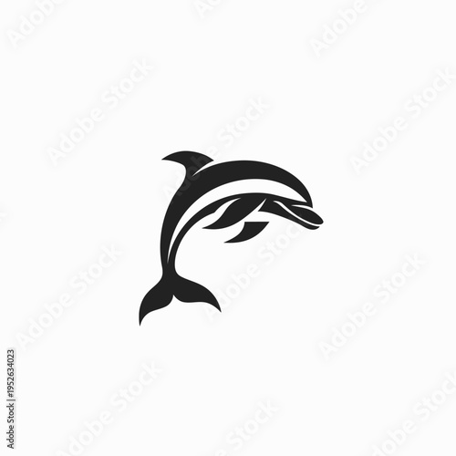 Stylized black silhouette of a jumping dolphin, elegant marine animal vector graphic, ocean creature minimalist design element.