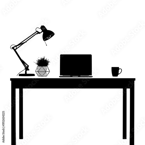 Desk with laptop and office supplies.