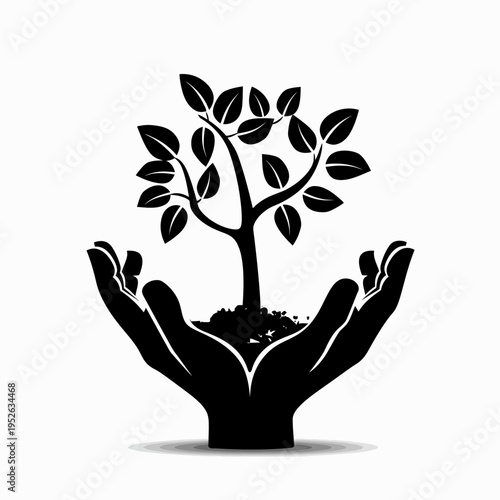 Hands holding a growing tree silhouette, symbolizing environmental protection, sustainable development, and nature conservation.