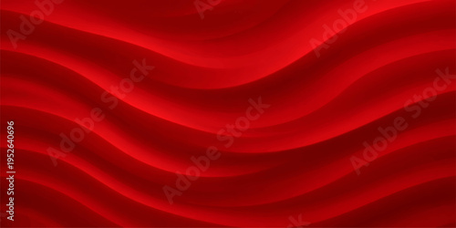 A luxurious red silk and satin fabric background featuring smooth flowing waves of soft textile material creates an elegant shiny backdrop design for decorative wallpaper