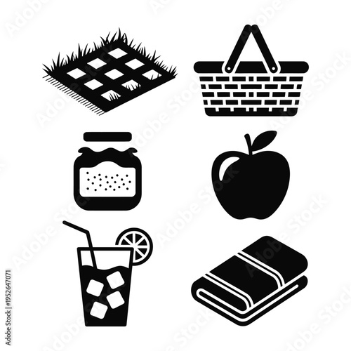 A picnic icon set including a blanket, basket, and food items