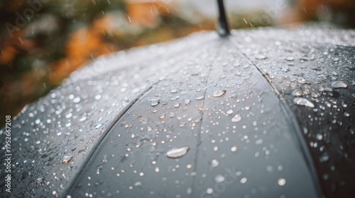 Closeup umbrella rain raindrops water droplets wet surface texture pattern weather protection outdoor detail background moisture rainy season concept macro calm atmosphere