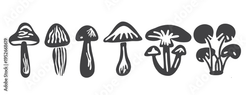 Hand-drawn mushroom collection: vector bold linocut set of forest fungi, amanita, enoki cluster. Gray mystical silhouette illustration, gothic spooky drawing with gills and stems isolated on white
