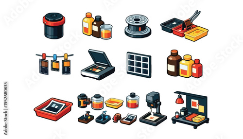 A collection of photographic developing equipment and supplies is displayed.