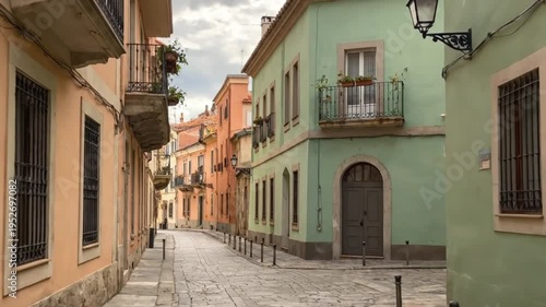 Charming colorful street lined with historical buildings and balconies.