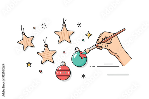 Handmade Christmas ornaments simple wooden stars and round baubles being painted with a small brush, expressing creativity and festive anticipation in a