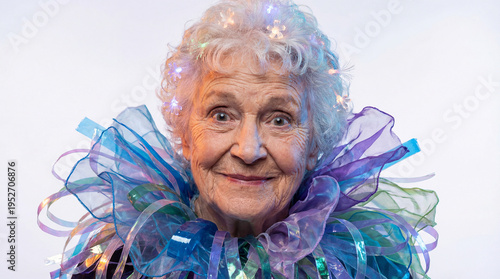 Person wearing colorful decorations with lights at a joyful celebration event in a studio setting during the evening