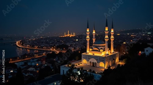Stunning night view of a grand mosque with four minarets overlooking a vibrant city