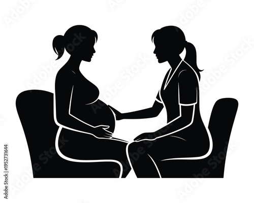 Pregnant woman receiving care from a doctor or midwife during a consultation