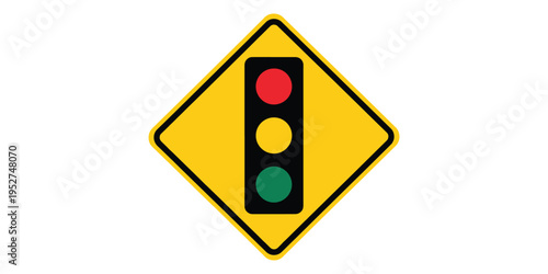 Traffic sign with a traffic light on a yellow diamond shaped background isolated on white background