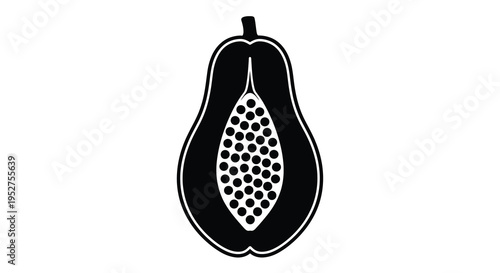Halved papaya fruit with spotted seeds a striking silhouette