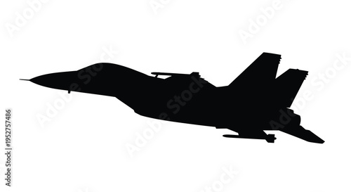 A sleek fighter jet in flight captured as a dark silhouette