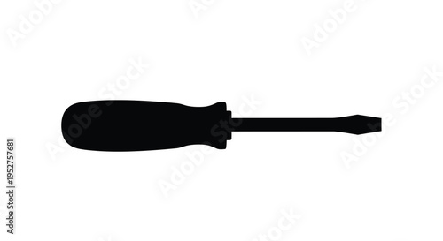 A flathead screwdriver depicted in a striking black silhouette