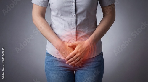 Woman experiencing pelvic pain or menstrual cramps in abdomen