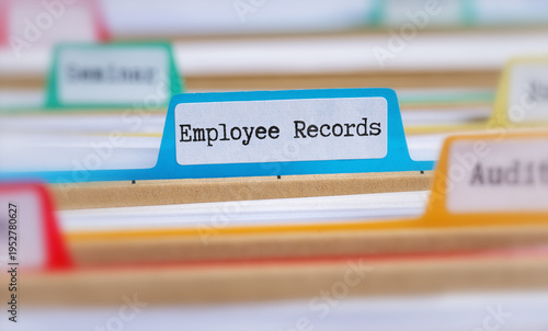 File folders with a tab labeled Employee records