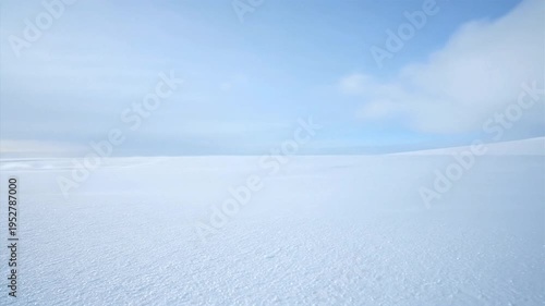 Serene Snowy Landscape with Cloudy Sky.