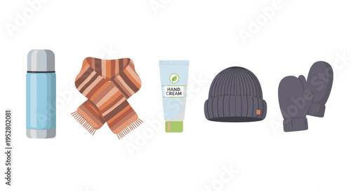 Winter accessories including a thermos, scarf, hand cream, beanie, and mittens are neatly arranged, representing essential items for cold weather protection and comfort.