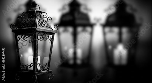 Black metal lantern with candle light.