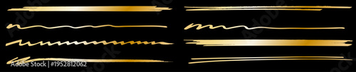 ゴールドの筆ストロークと手描きラインの装飾セット・高級感あるブラシ素材コレクション黒背景