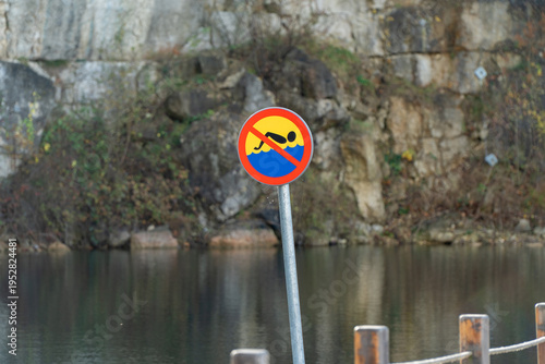 Swimming prohibited sign on a water reservoir