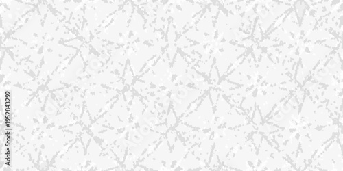 Abstract pattern of light grey spiky shapes on a white background