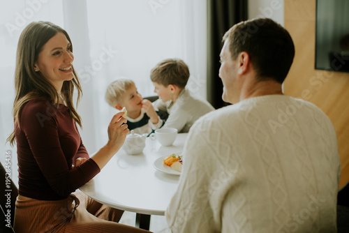 Family enjoys breakfast tog...