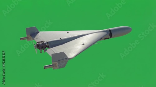 Delta wing kamikaze drone flying against green screen background. Unmanned attack aircraft with rear propeller and grey fuselage for military operations. Static wide shot.