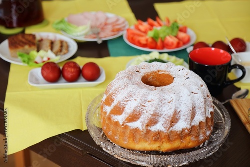 Easter cakes table in Poland. Easter pastry: babka cake. Easter in Poland - Wielkanoc.