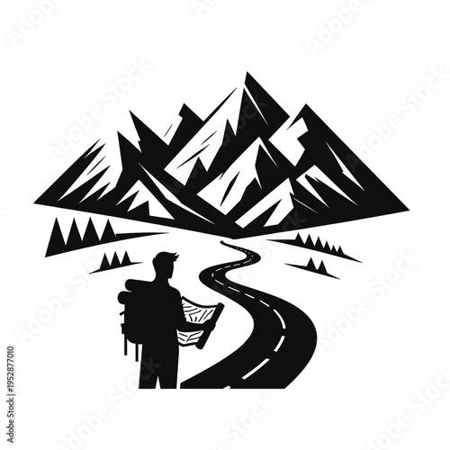 Hiker ascending winding mountain path surrounded by jagged peaks