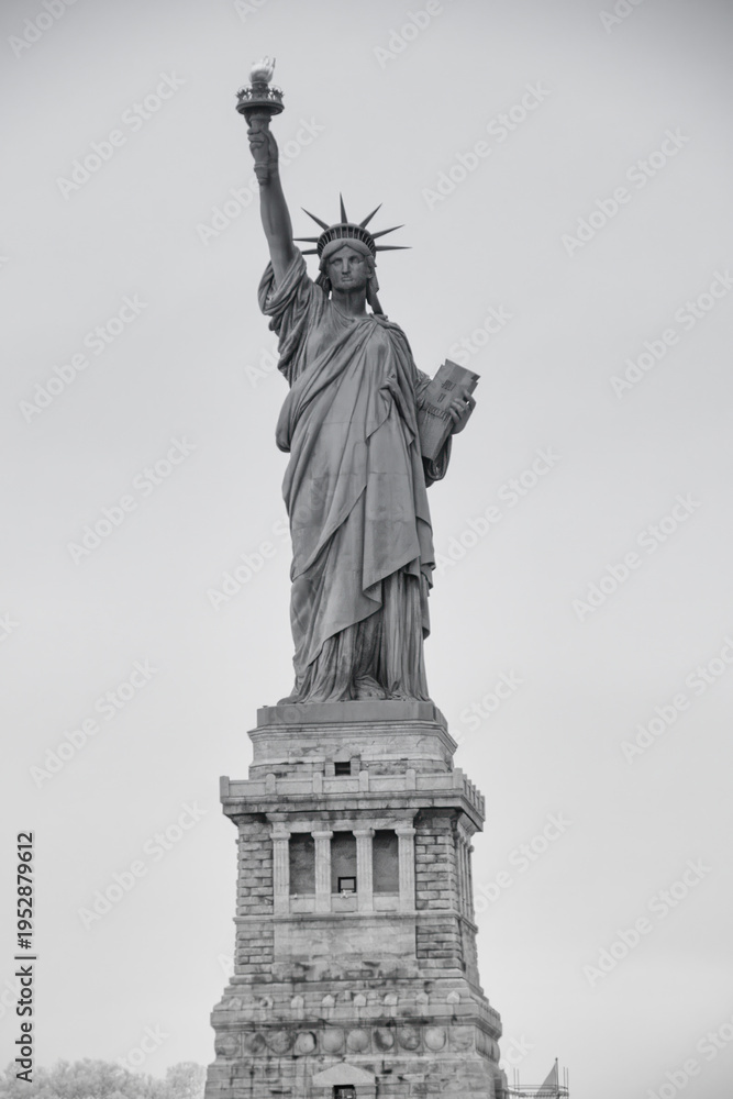 Fototapeta premium Statue of Liberty seen from the ferry through infrared photography dramatic view NYC