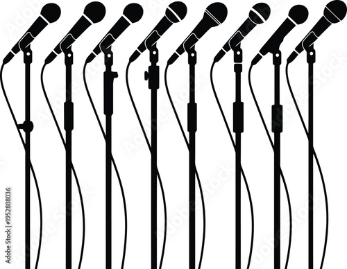 Microphones stand on stage ready for use