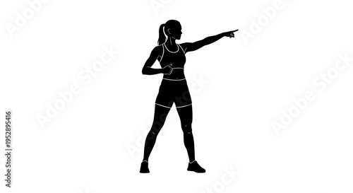 Woman in athletic wear pointing forward with her right hand and thumb up with her left hand wearing a sports bra and shorts