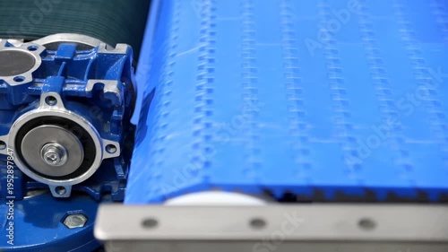 Conveyor belt in production. Transporting goods in a warehouse.