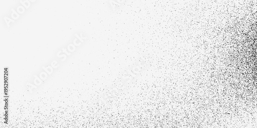 Gritty black grain texture on white background with spray paint effect