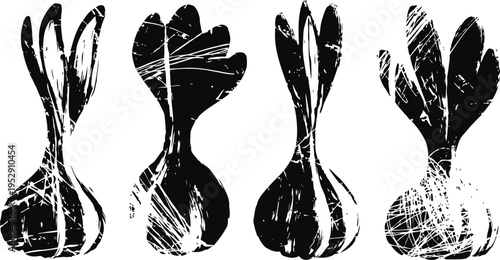 grunge black and white garlic silhouettes set with textured distressed effect, vegetable design elements
