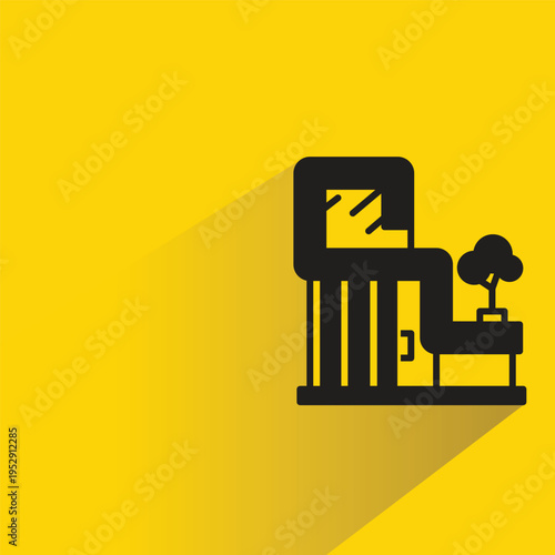 modern house building icon with shadow on yellow background