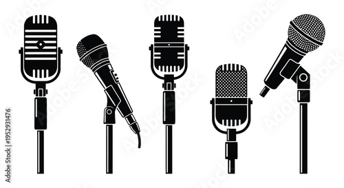 Silhouette of five classic microphones in a row on stands