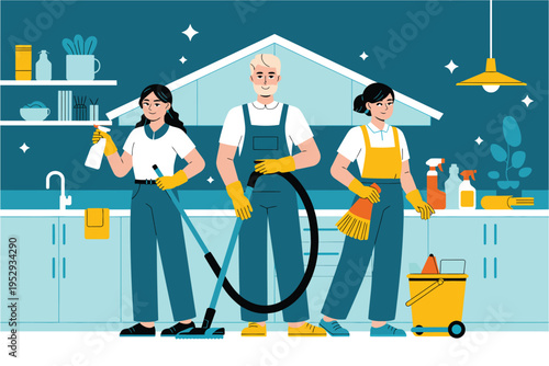 Professional cleaning service team standing in modern kitchen with vacuum cleaner and supplies wearing blue overalls and yellow rubber gloves