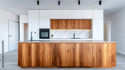 Modern luxury kitchen interior featuring a large wooden island, white flat panel cabinetry, and marble backsplash